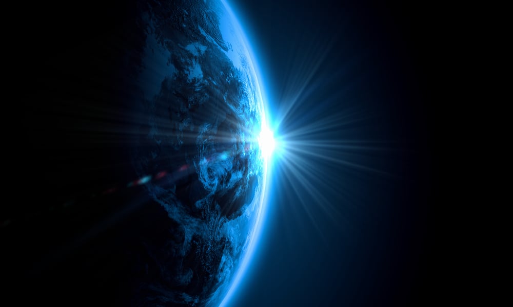 Planet Earth with appearing sunbeam light. Elements of this image are furnished by NASA