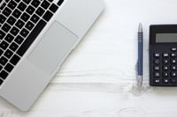 Laptop computer on a wooden table with a modern look.jpeg