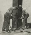 Three-workers-securing-a-rivet-1931-520x418-500x401-085275-edited.jpg